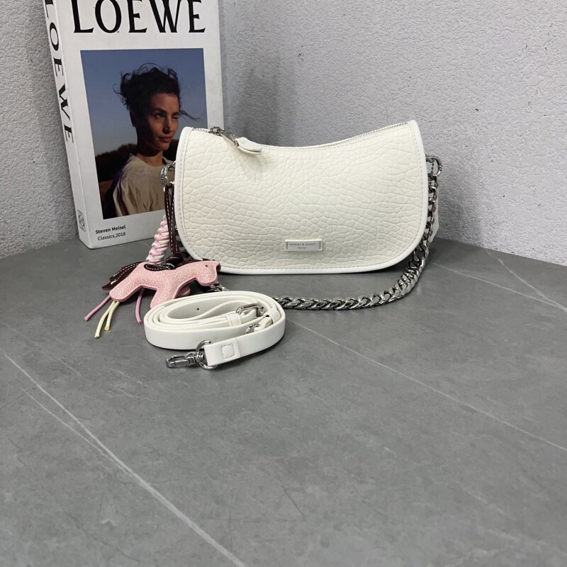 2026新款韩版时尚泡泡纹饺子包质感百搭链子腋下单肩包纯色斜跨包