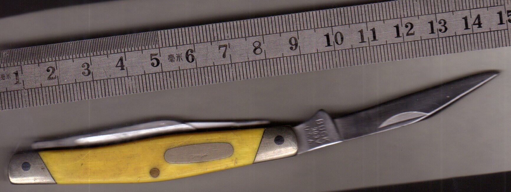 美国 Buck 巴克黄色手柄303野营刀具户外多功能组合工具内含三刃