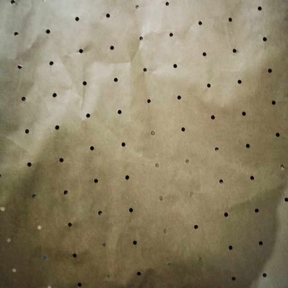 纸厂透气批发服装用打孔牛皮纸电脑裁床打孔纸复卷打孔牛皮纸