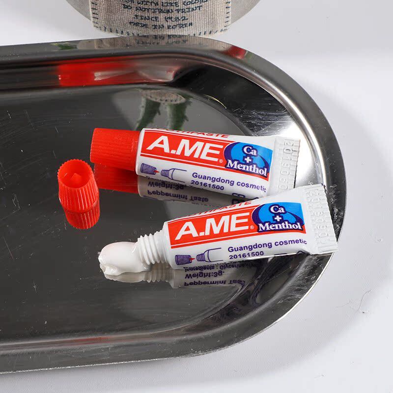 一次性牙膏酒店宾馆客房洗漱用品英文牙膏牙刷整箱批发旅游小牙膏