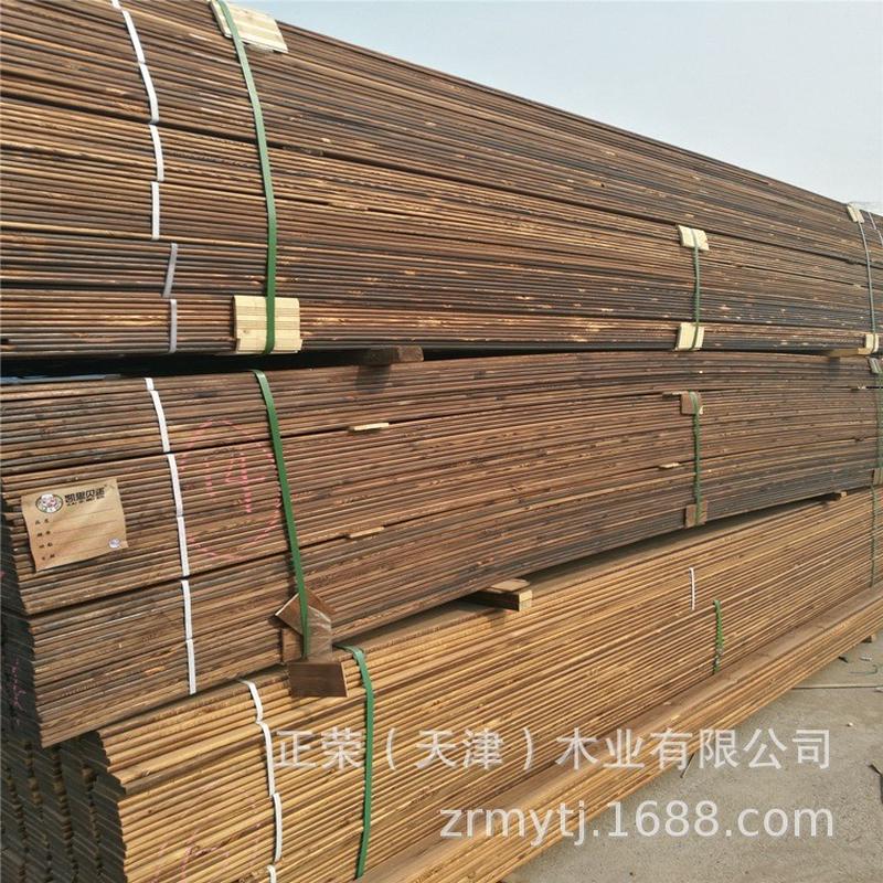 木材厂家销售樟松防腐木庭院木户外碳化实木板加工景观实木圆柱