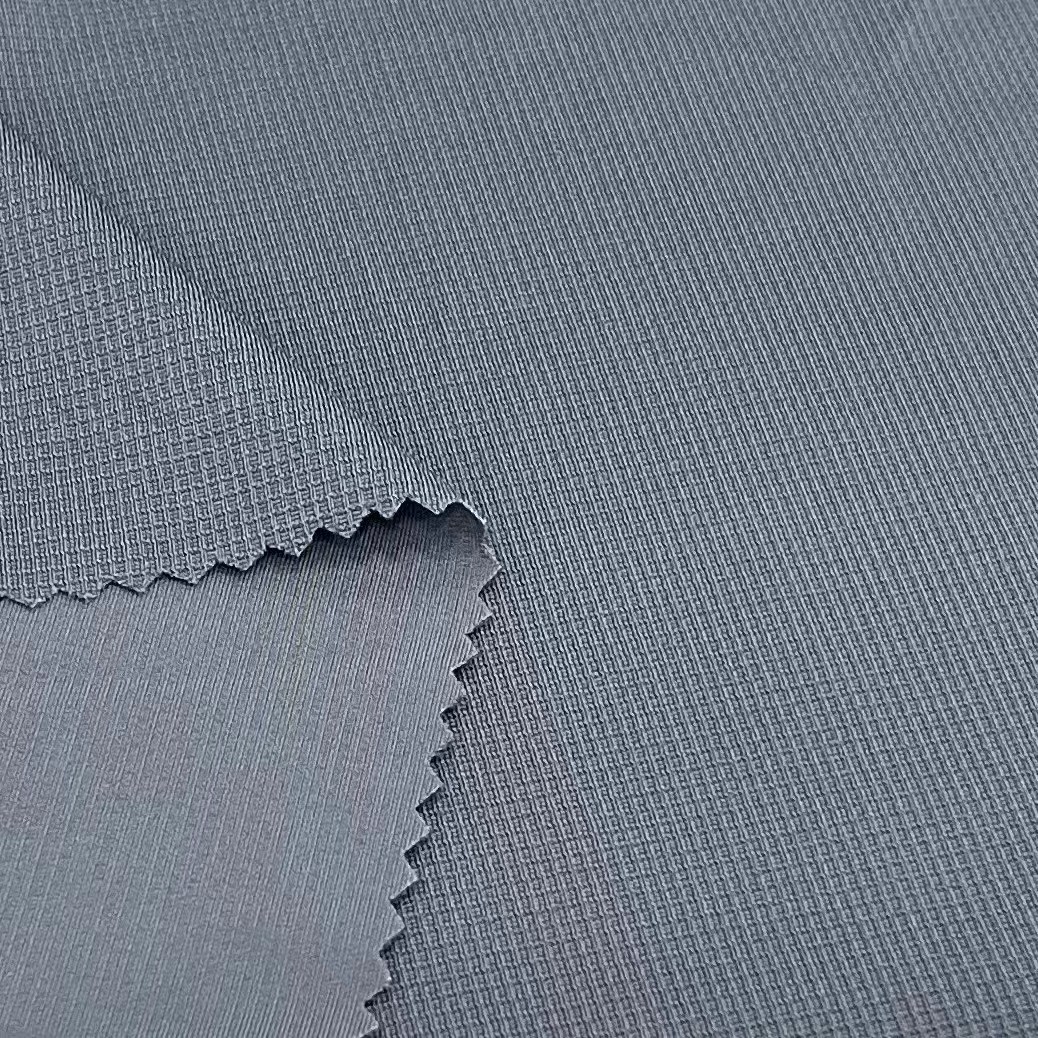 锦纶锦纶面料冰丝提花面料休闲时尚高端服装面料现货供应