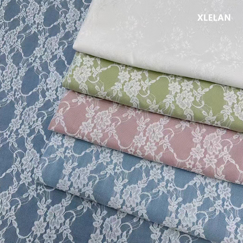 32支复合春夏牛仔面料服装面料箱包布料小碎花复合蕾丝牛仔水洗布