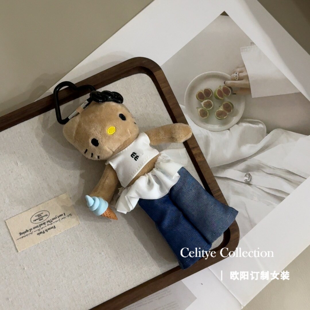 韩版时尚蝴蝶结蓝色冰淇淋黑皮长腿KT猫百搭多用包挂件  35682