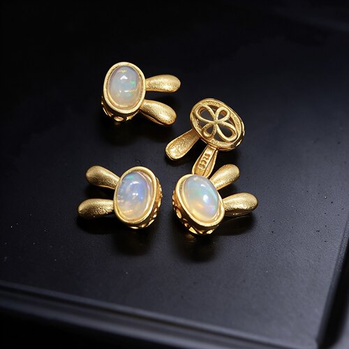 S925镀金欧泊兔头串隔款