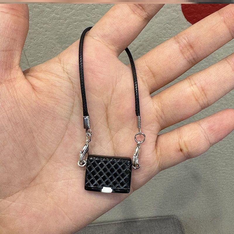 适用于拉布布复古饰品DIY遛娃迷你黑白搪胶娃娃挂件娃用斜挎包