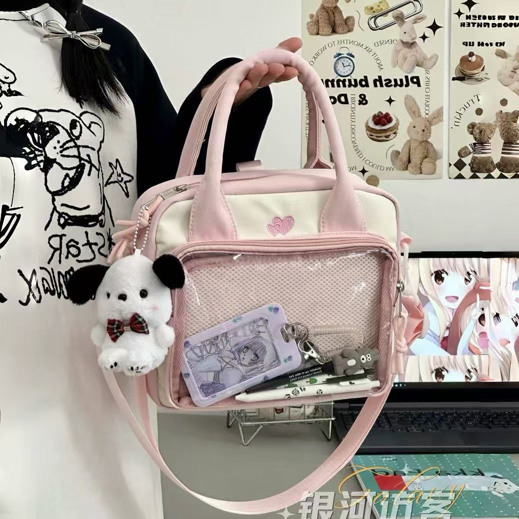 纯色二次元斜挎包日系学院大容量百搭单肩包谷子吧唧扎板痛