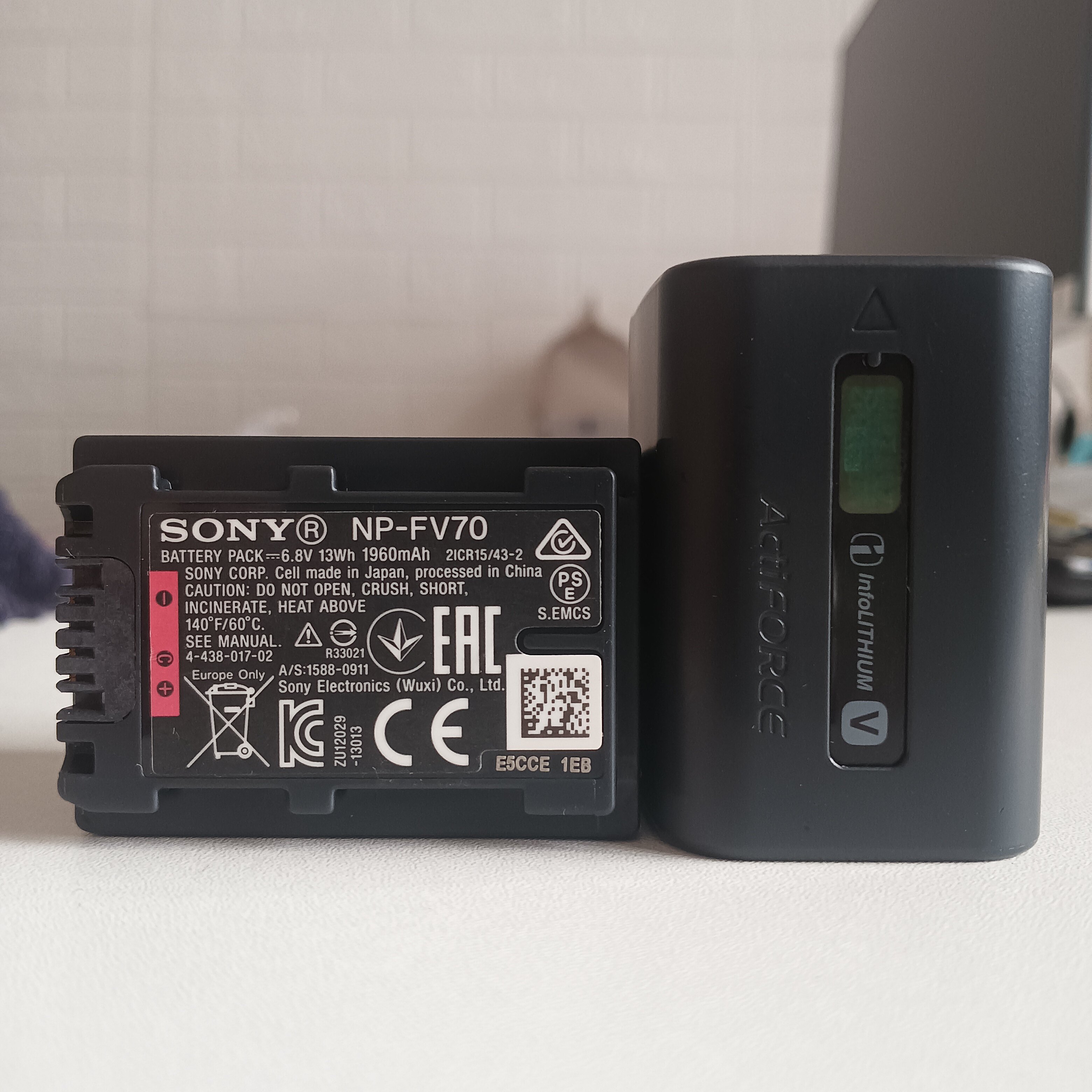 索尼NP-FV70原装AX100 PJ580E PJ670 AX30 AXP35 FV70A摄像机电池