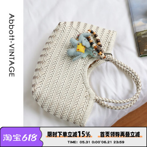 牛皮编织手提斜挎度假包菜篮包