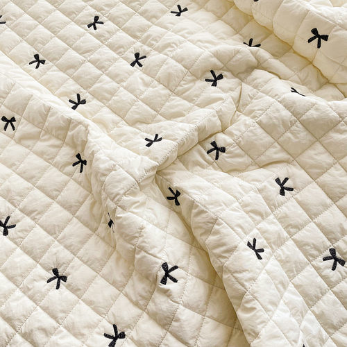 蝴蝶结刺绣米色压棉夹棉服装面料