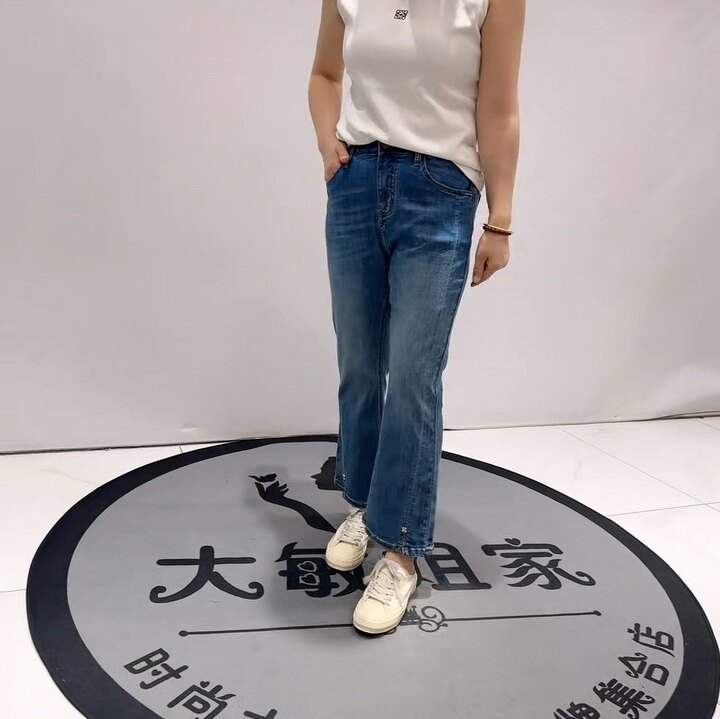 柏菲蒂8928春夏松紧腰四面弹力侧面开剪微喇牛仔裤加肥加大码女裤
