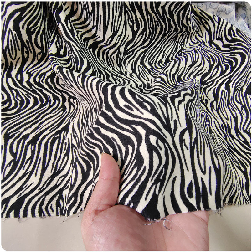 春秋冬黑米白斑马斜纹磨毛华达呢布料套装连衣裙裤子西服装面料