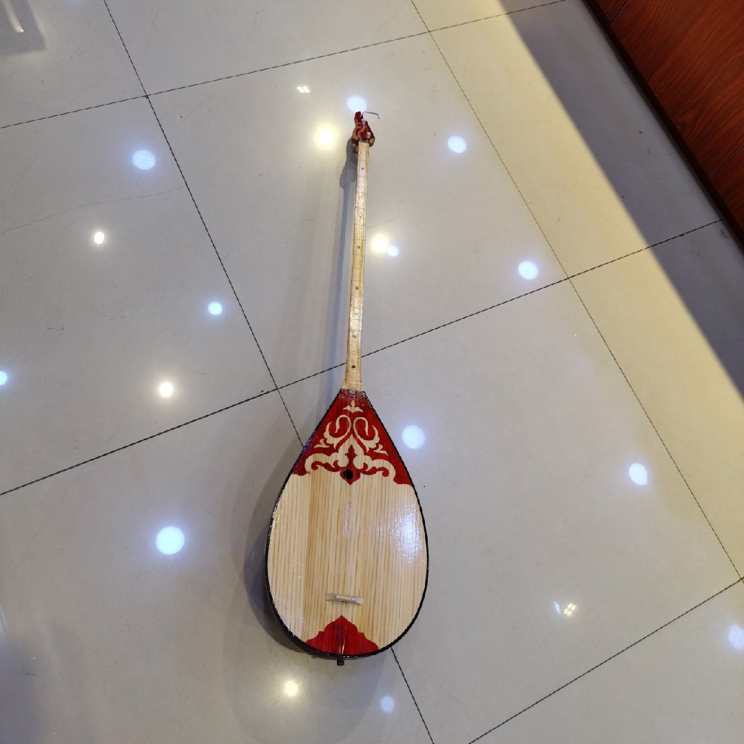 冬不拉是什么乐器,阿肯_大山谷图库