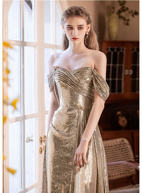 一字肩晚礼服女2026新款金色新娘订婚礼裙敬酒服高级感宴会主持人