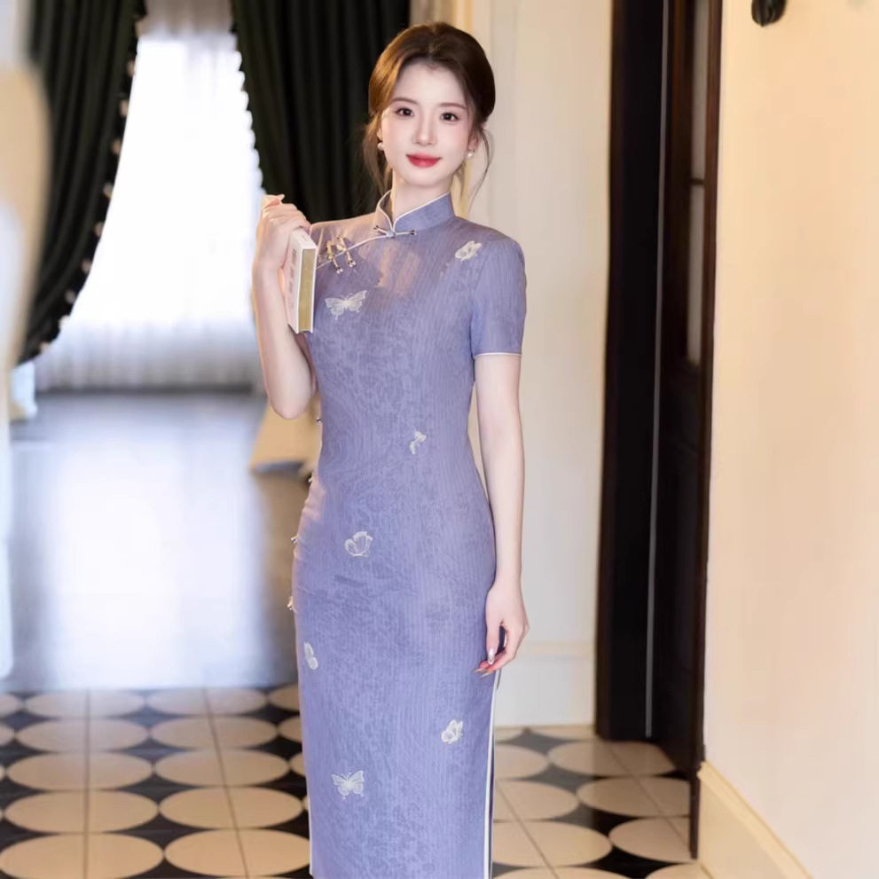 2026春夏新款旗袍新中式浅蓝色印蝴蝶旗袍TR棉麻印花长款短袖旗袍