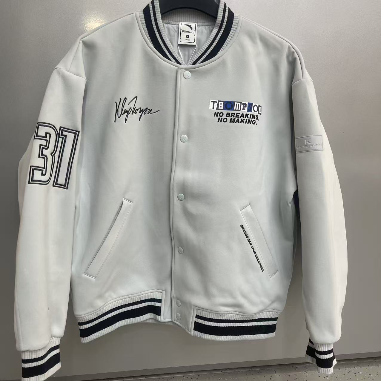 安踏2025冬男保暖宽松棒球服上衣