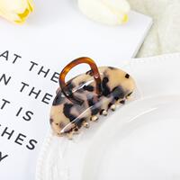 Danish Evita Peroni hair clips with a high-end acetate grip for women, featuring shark hair clips on the back of the head thumbnail 5