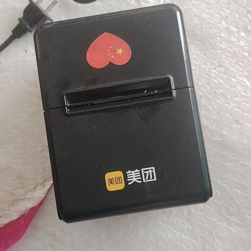 热敏打印机,功能正常,配件只有电源线,成色如图,--议价商品