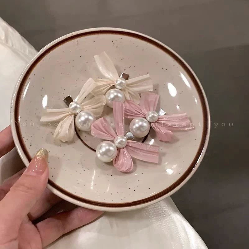 甜美珍珠蝴蝶结女童鸭嘴夹