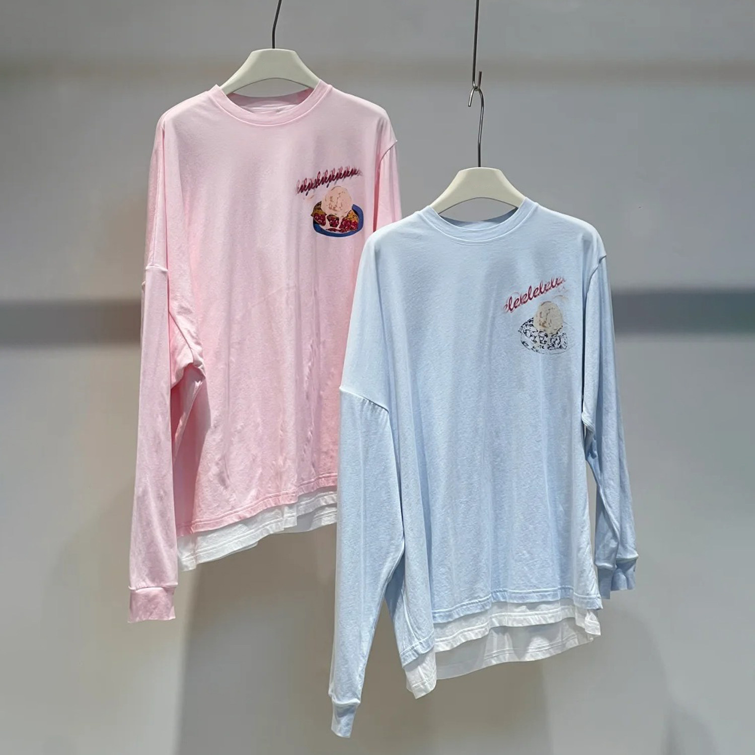 深圳南油高端女装2026春季新款韩式卡通休闲风印花宽松百搭上衣女