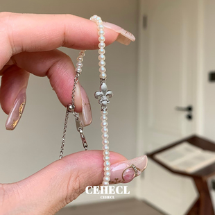 精致银色拉丝鸢尾花珍珠手链女法式中古叠戴千金感高级感串珠手饰