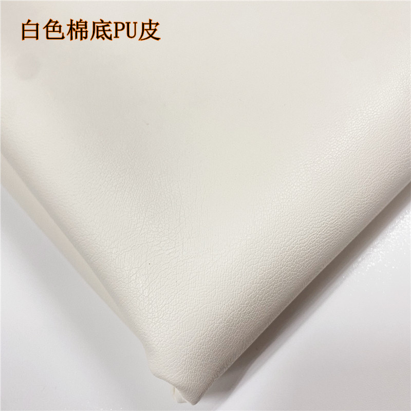 进口仿真皮革白色服装皮衣布料