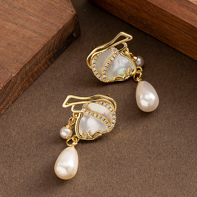 流行款镶钻贝壳女人头人像耳环