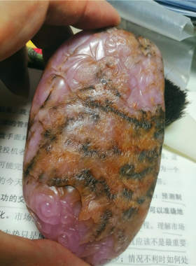 把件新疆和田玉籽料（桃花玉把件