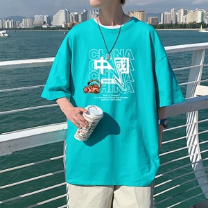 T3302P25男士男士港风T恤落肩款宽松T恤克莱因蓝男T风印花T恤图片