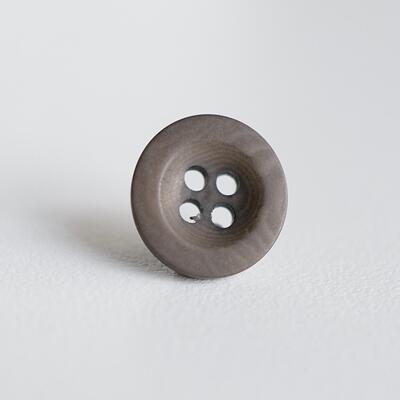 卡其灰中间内凹象牙棕榈纽扣