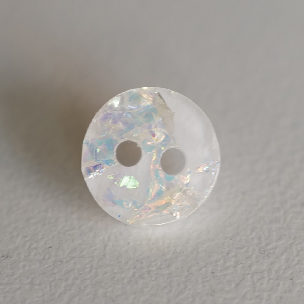 英国白色闪亮涤纶纽扣10mm一颗