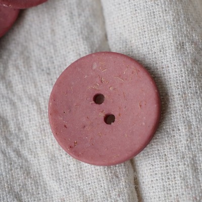 深脏粉色纹理表面环保纽扣