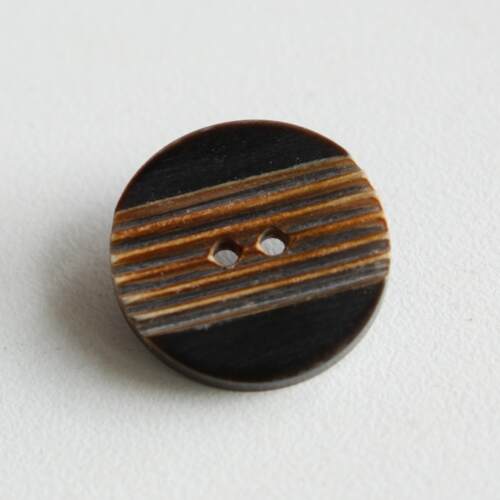 黑水牛角纽扣中心烤焦锯齿纹理