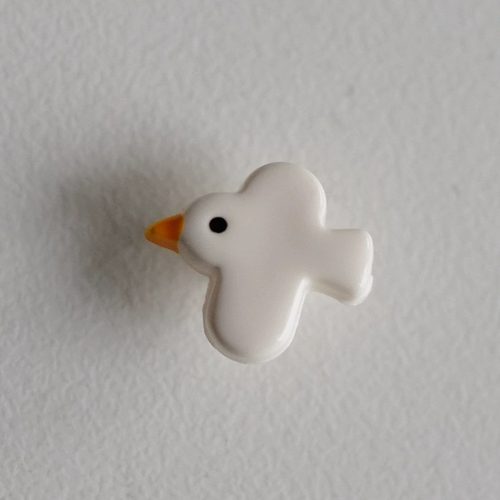 光亮黑眼睛乳白色飞鸟造型纽扣