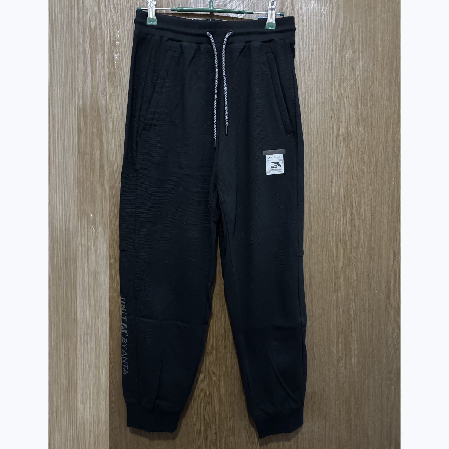 安踏正品春秋休闲训练健身青年潮流舒适男针织运动长裤152437315