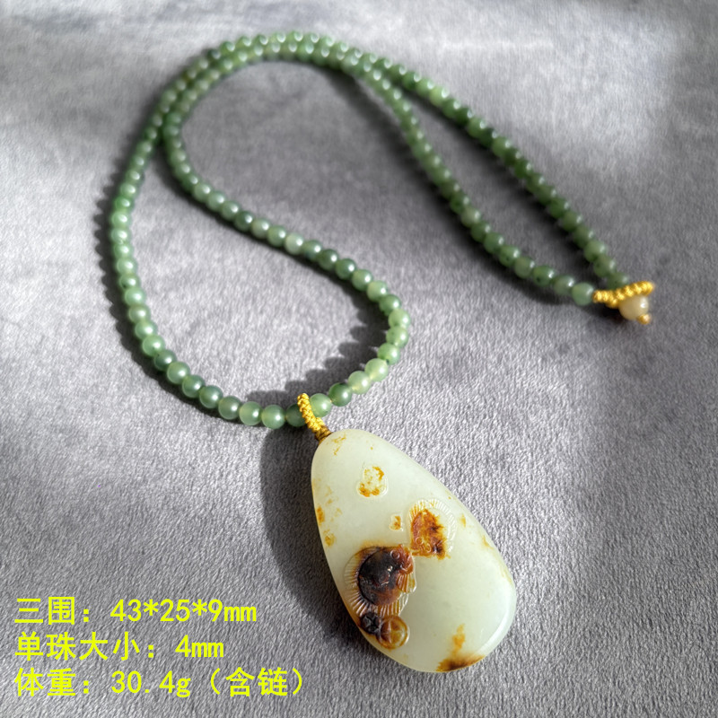 脂份很好的红沁皮白玉双鱼挂件