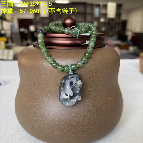 唯美的双鱼墨玉籽料挂件
