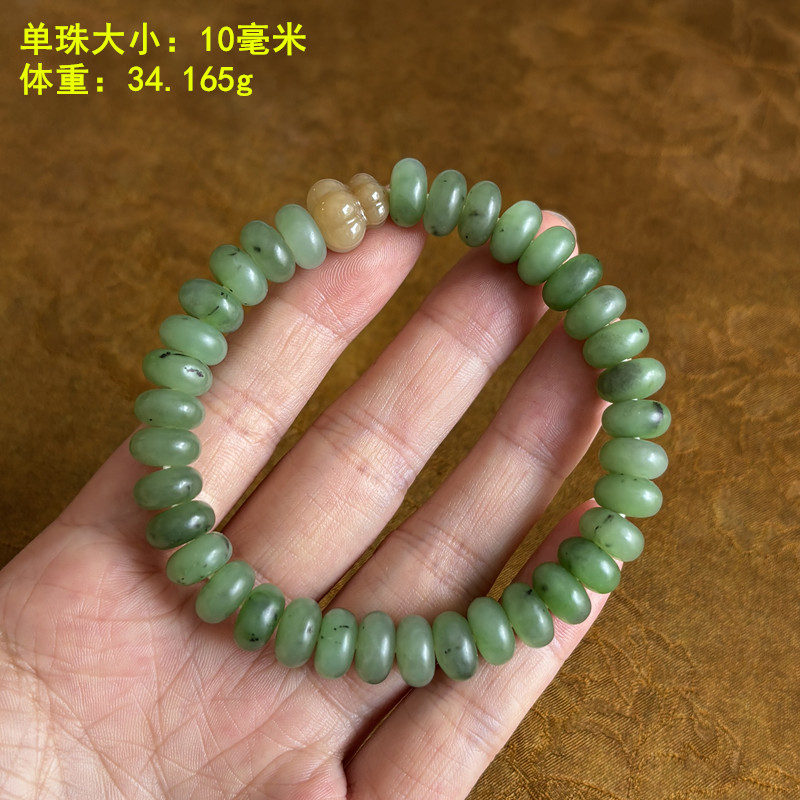很清新的一串碧玉籽料撞糖玉手串