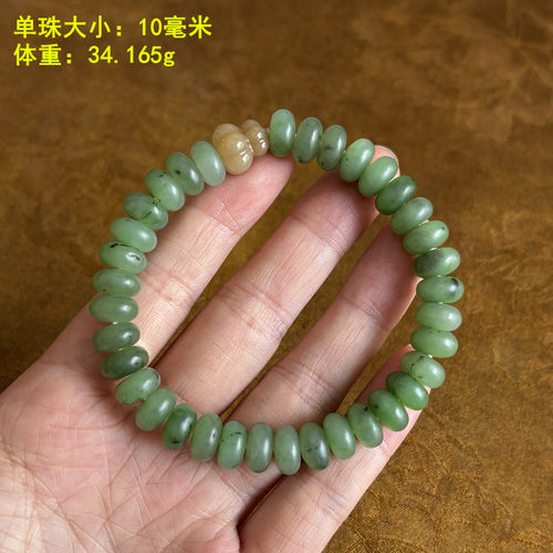 很清新的一串碧玉籽料撞糖玉手串