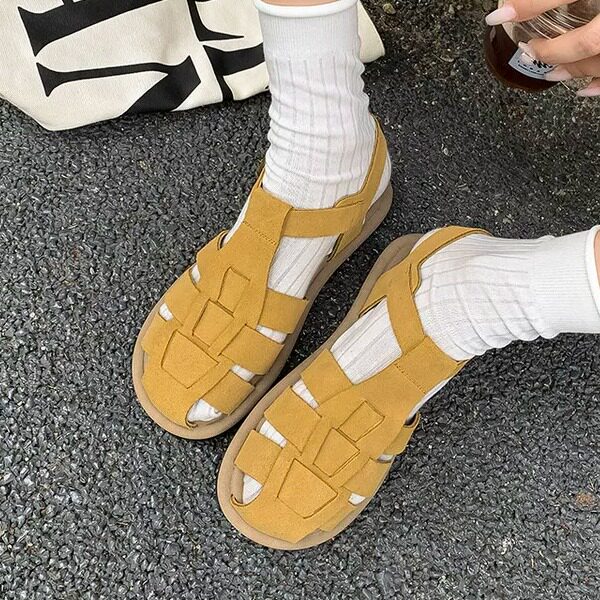 牛皮编织包头平底罗马凉鞋女夏季镂空百搭舒适软底休闲鞋