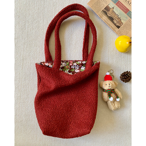 复古暗红色肌理羊毛呢水桶包