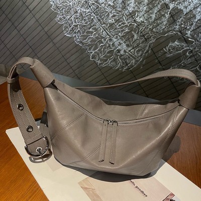 普洛克正品皮春季新款真皮轻奢高级感小众时尚单肩斜挎腋下包包女