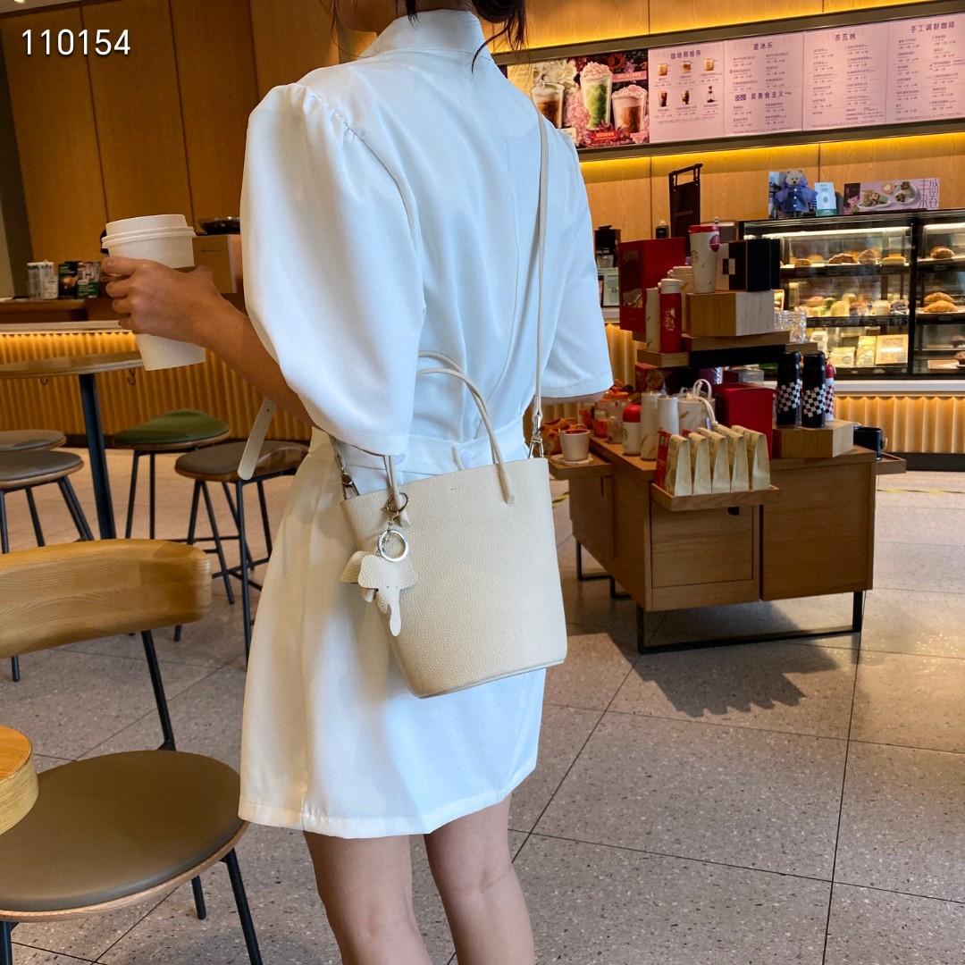 普洛克正品头层女包牛皮水桶包女复古小包日单肩斜挎腋下包包潮