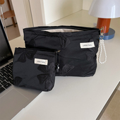 旅行便携式 化妆包蝴蝶结帆布手拿包女拉链收纳袋小众设计黑色女包