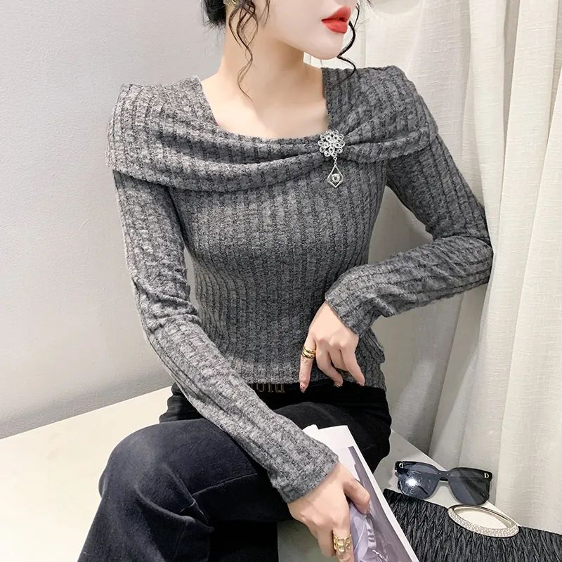 性感一字肩T恤女长袖秋冬欧货时尚蝴蝶结上衣洋气修身内搭打底衫