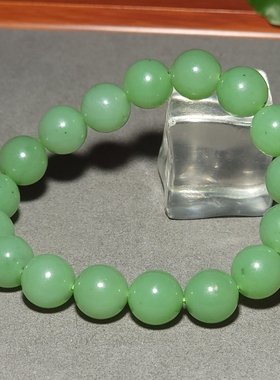 L122902 46.0克，直径12mm油润细腻色调靓丽的苹果绿圆珠手链