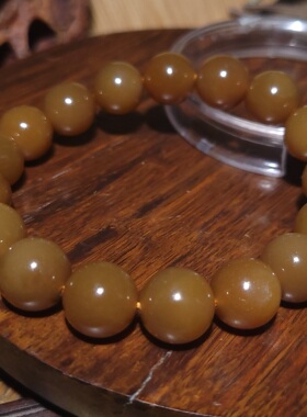 YQ032604新疆的猫直径12mm44.4克色调鲜靓和田玉且末红糖玉手链