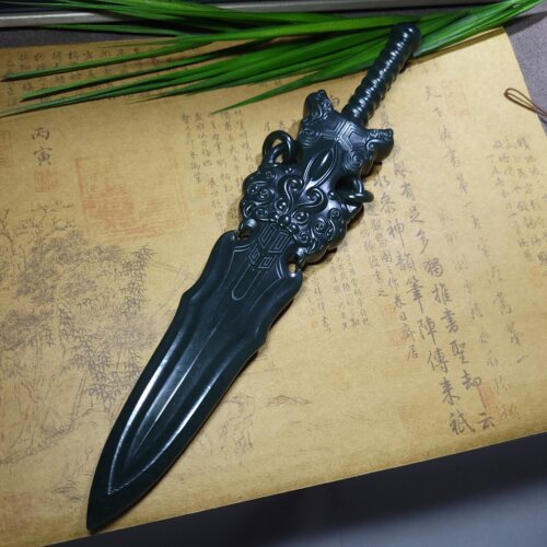 Z051805新疆的猫227.7克高油份雕刻精细格尔木黑青玉降魔剑