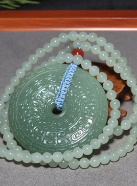 新疆的猫L102803 65.3克色调油亮肉质纯净且末青白玉回纹壁+挂链