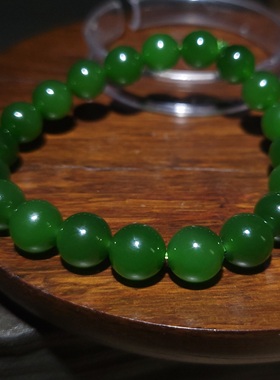 YQ010903新疆的猫27.8克直径10mm色泽鲜美均匀阳绿和田玉碧玉手链